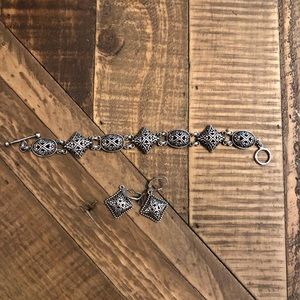 Silver bracelet and earrings to match